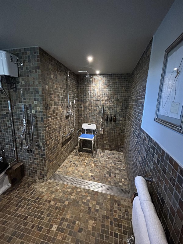 Wheel in shower with a chair for those who can transfer