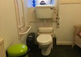 Image of toilet in accessible/baby changing toilet.