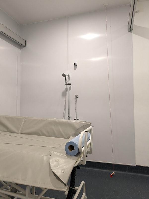 Image of Adjustable change bed in the Changing Places toilet