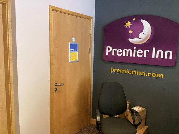Entrance to accessible toilet in reception area.