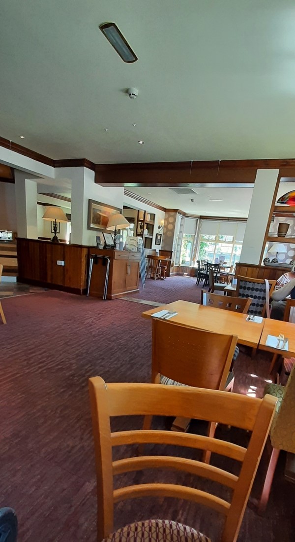Seats and tables inside the pub