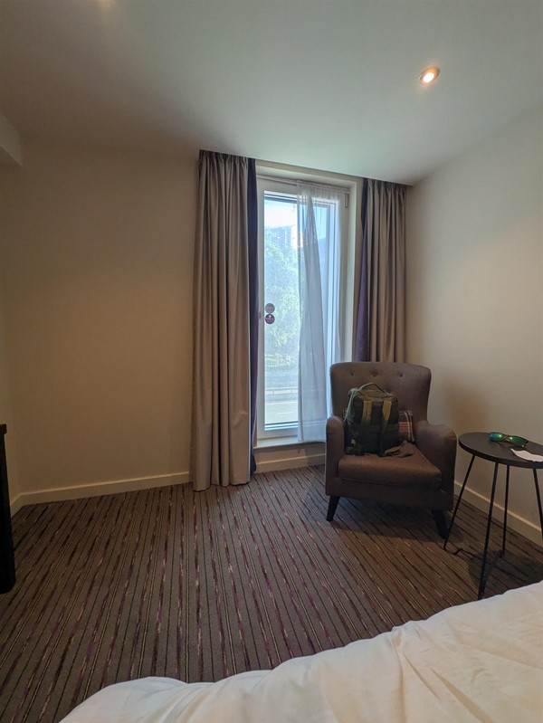 Image of bed and window in the bedroom