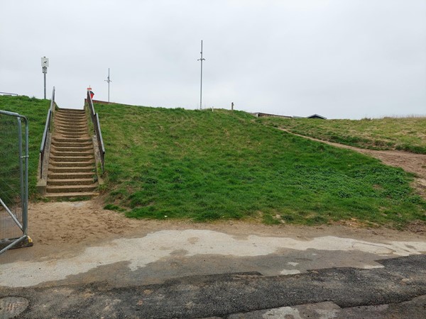 Bank from toilet block to disabled car park