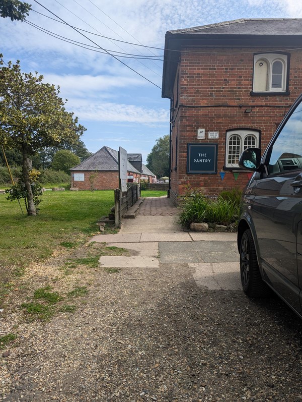One short steep slope and a bit of wonky paving might need a push