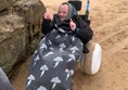 Picture of a person in a beach wheelchair