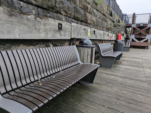 Image of wooden benches at Ianto's Shrine