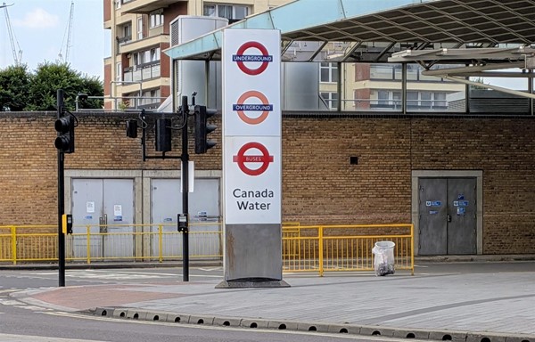 Image of Canada Water sign with symbols for buses, London Underground and London Overground