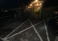 Image of a parking space in the dark