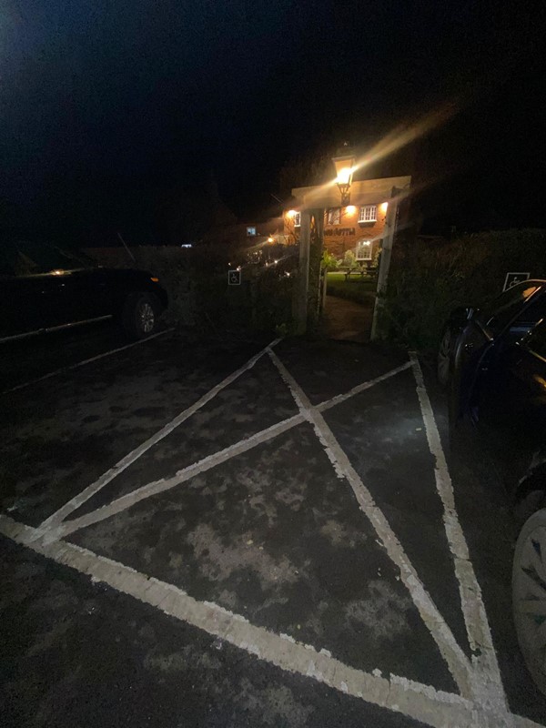 Image of a parking space in the dark