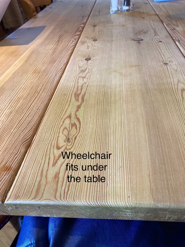 Wheelchair fits under the table