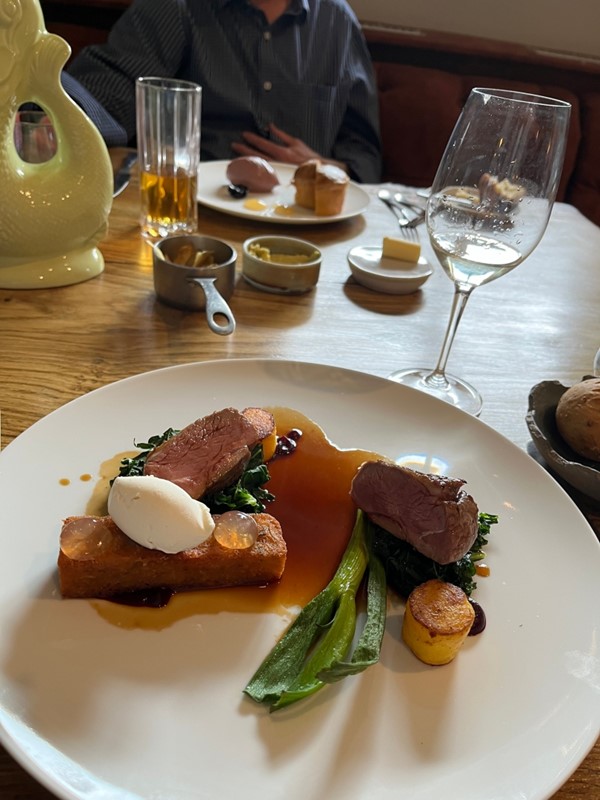 My main - Swannington Lamb Rump, Crispy Potato Pavé, Wild Garlic Emulsion, Squash Fondant, Charred Spring Onion, Mint Vinegar, Goats Cheese Mousse, Lamb Jus