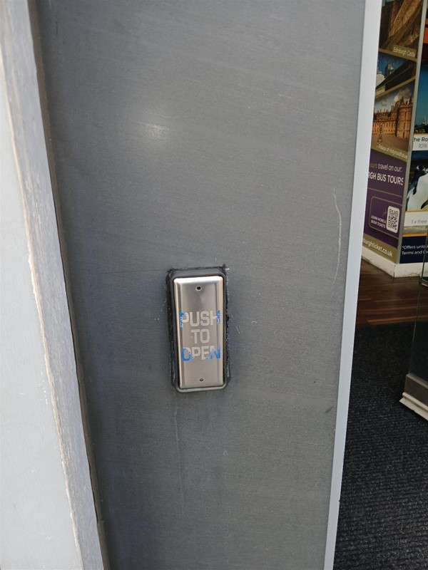 image of the door open button on the outside of the right door