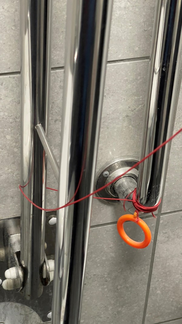 The emergency pull cord was deliberately tied so tight around the handrail that it took 10 mins for the manager to untie it.