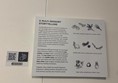Information board about how the experience is multi-sensory, and a QR code which takes you to a BSL interpretation video