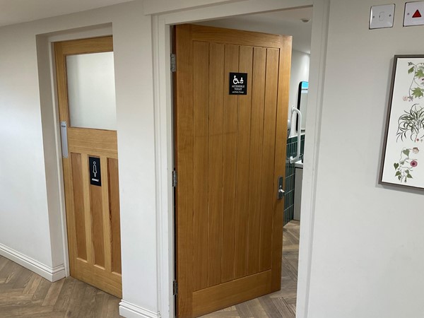 Picture of the door of an accessible toilet