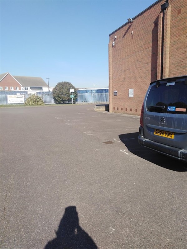 Spacious car park with disabled places close to the entrance.