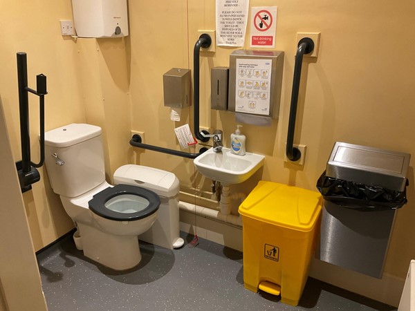 Accessible toilets, very basic with pull cord and grab rails