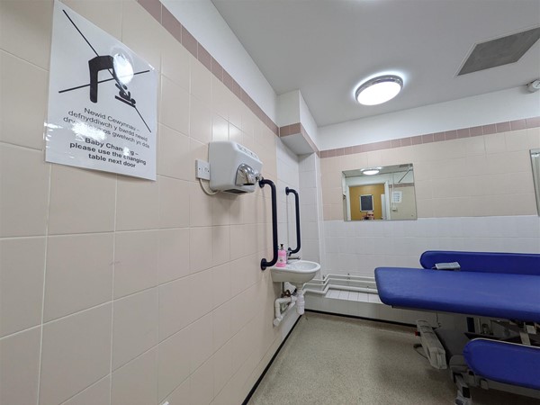 Image of Adjustable change bed in the Changing Places toilet