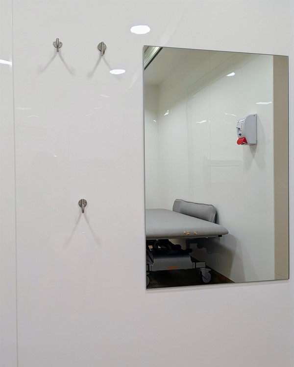 Image of coat hooks and mirror