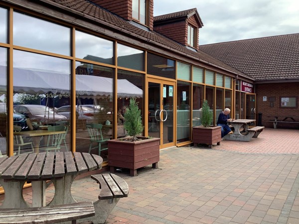 (11) level entrance into cafe and separate restaurant.