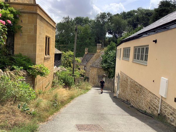 Man walking up a steep path