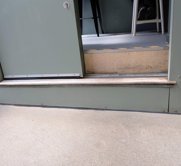 Image of huge step into stall