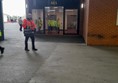 Man in an orange hi viz jacket