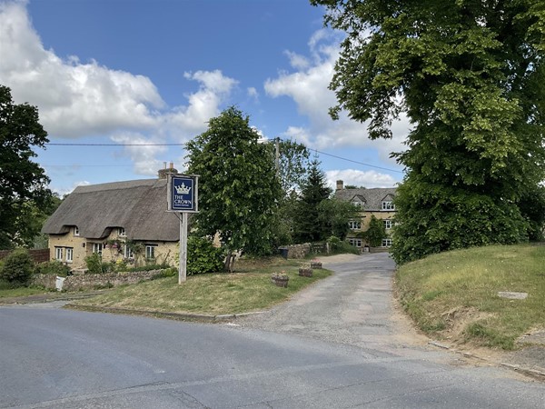 Image of a path by a cottage