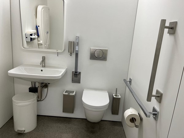 Accessible toilet near the cafe in same corridor.