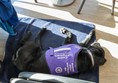 Assistance dog, lying on a mat having a proper sleep.