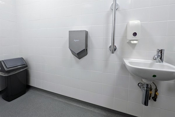 Image of accessible toilet sink and hand dryer