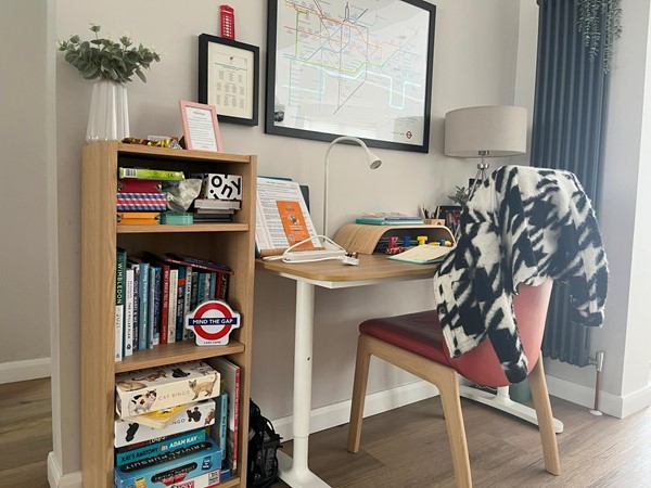 Image of the desk in the living room area.