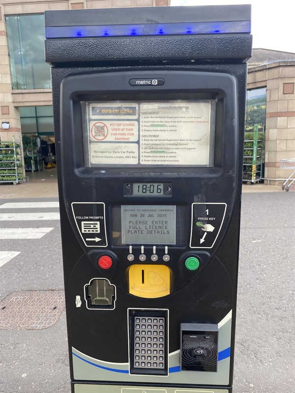 Image of the temperamental parking machines that don’t like coins.
