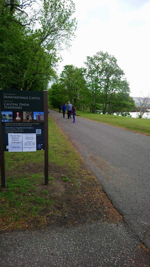 Picture of a sign by a pathway