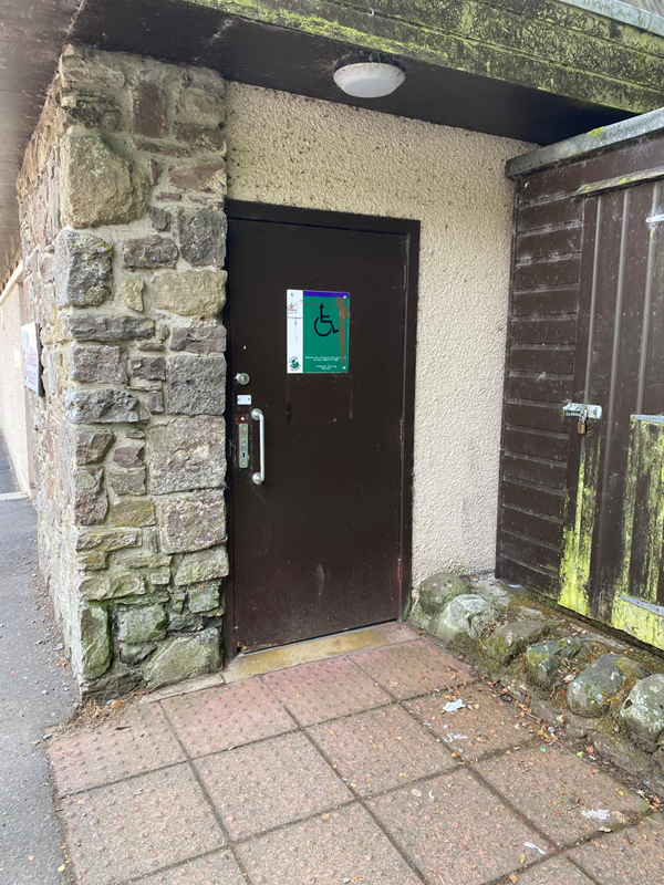 Exterior, toilet door and pavement