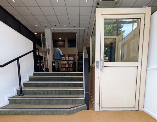Image of stairs and lifts to reach shop floor from the Castle Meadow entrance