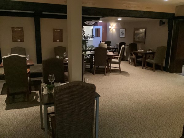 picture of a small alcove available with four tables and chairs