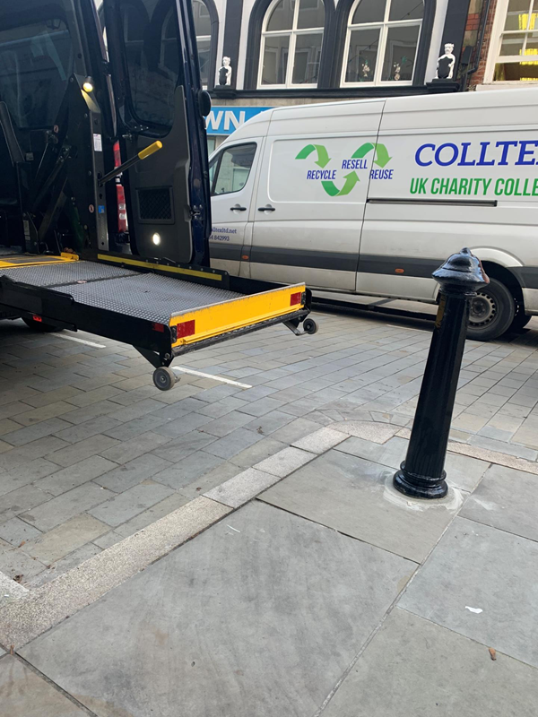 This is my vehicle, as you can see I had to park some distance from the back curb, taking up another space in this disabled parking bay