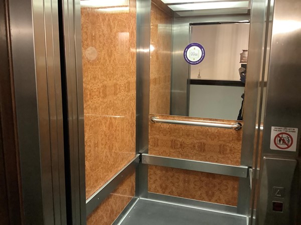 Lift large enough to get a chair and carer